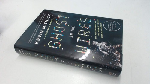 Ghost in the Wires book cover showing hacker silhouette and digital code