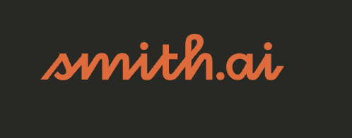 Smith.ai live website chat interface shown on MacBook screen